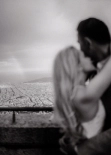 Close-up of a couple about to kiss, soft natural light, Barcelona engagement portrait
