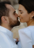 Intimate close-up of a couple leaning in for a kiss, natural tones, engagement session in Barcelona