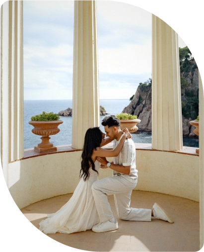 Surprise proposal photoshoot in Barcelona by the sea — romantic engagement moment captured by a Barcelona photographer