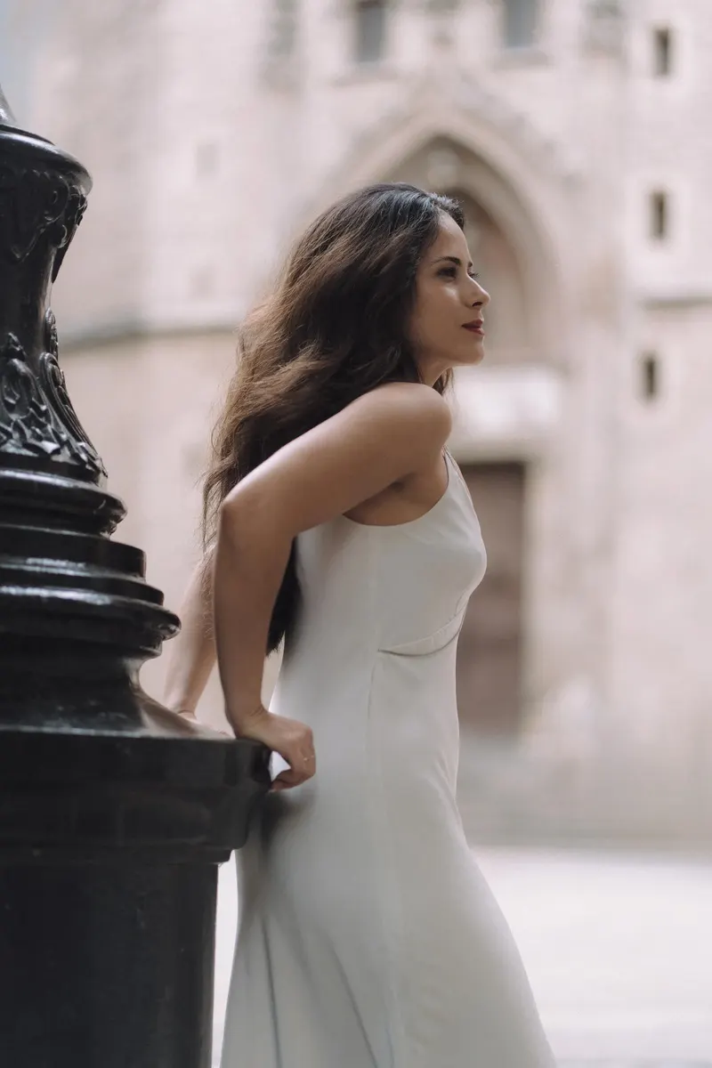 Ashley turns toward the camera during a graceful solo portrait in the Gothic Quarter.