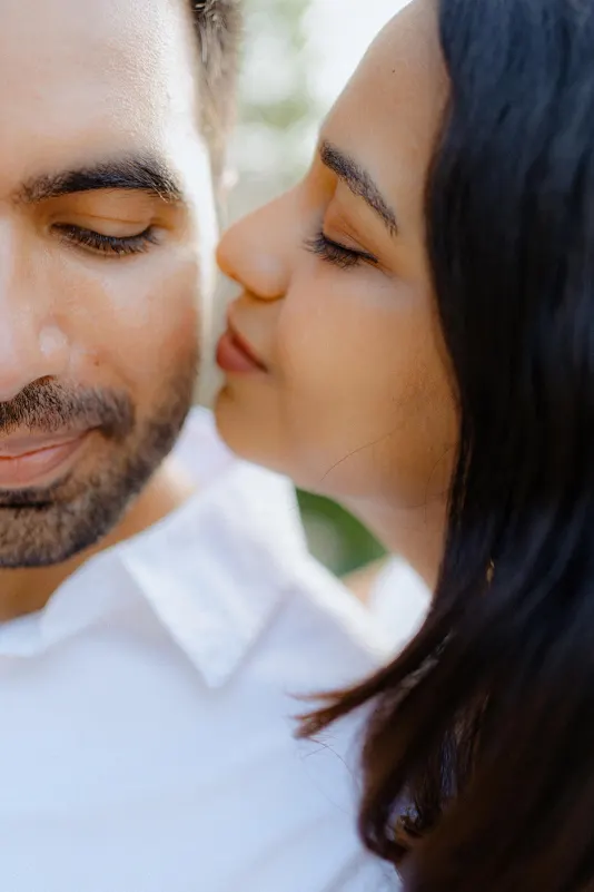 Close-up of a couple sharing a tender, joyful moment during their surprise proposal photoshoot in Barcelona.