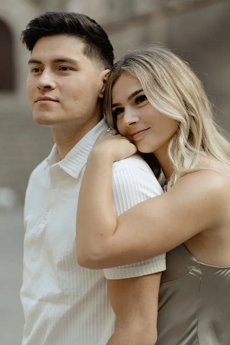 Couple sharing a quiet, affectionate embrace during their Vacation Portraits session in Barcelona’s historic quarter.