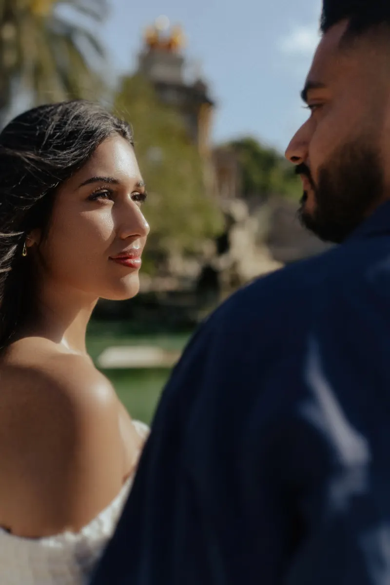 Couple sharing a quiet, heartfelt moment outdoors during a couples & engagements photoshoot in soft natural light.