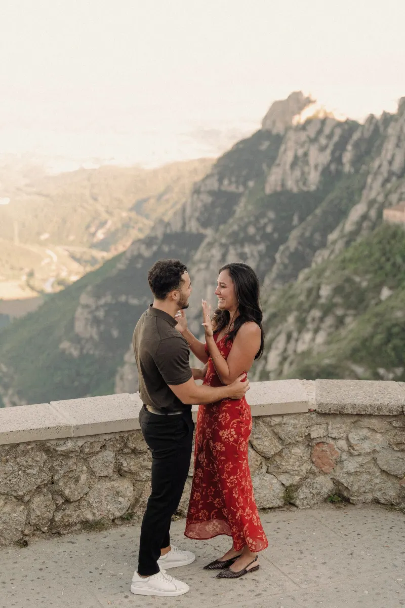 Dan and Sydney smile at each other immediately after their surprise proposal in Montserrat.