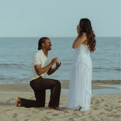 Dexter proposes to Cheryl on Castelldefels Beach during a romantic surprise proposal near Barcelona.