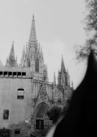 Moody black and white portrait of Barcelona’s Gothic Quarter, highlighting dramatic architecture for portfolio showcase.