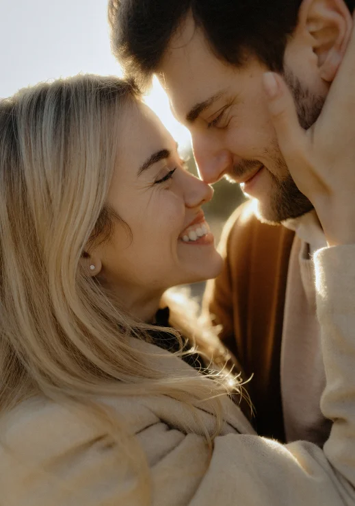 Couple sharing a joyful, intimate moment during a Vacation Portraits photoshoot in Barcelona.
