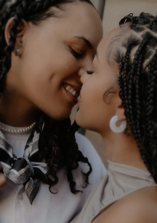 Joyful couple sharing an intimate moment during a surprise proposal photoshoot in Barcelona.