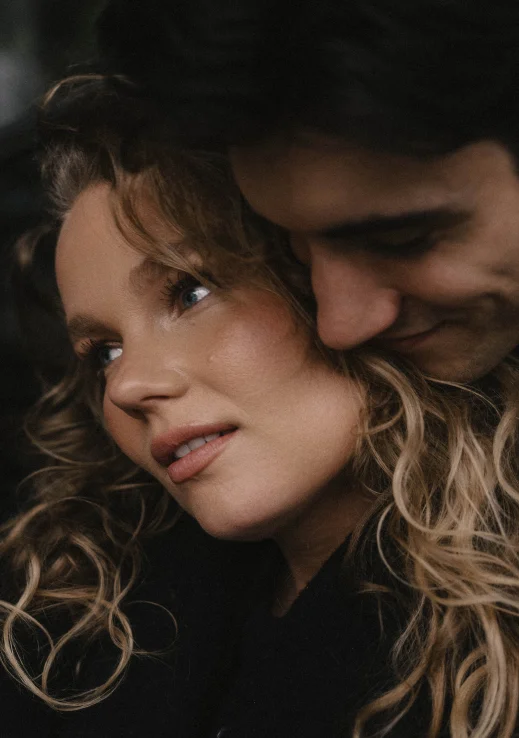 Tender moment between a couple during an engagement photoshoot in Barcelona, capturing love and connection.