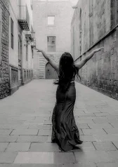 Artistic black and white solo photoshoot in Barcelona historic streets