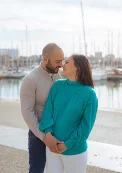 Couple portrait during family photoshoot in Barcelona marina