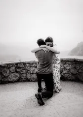 Emotional engagement moment during surprise proposal photoshoot in Barcelona